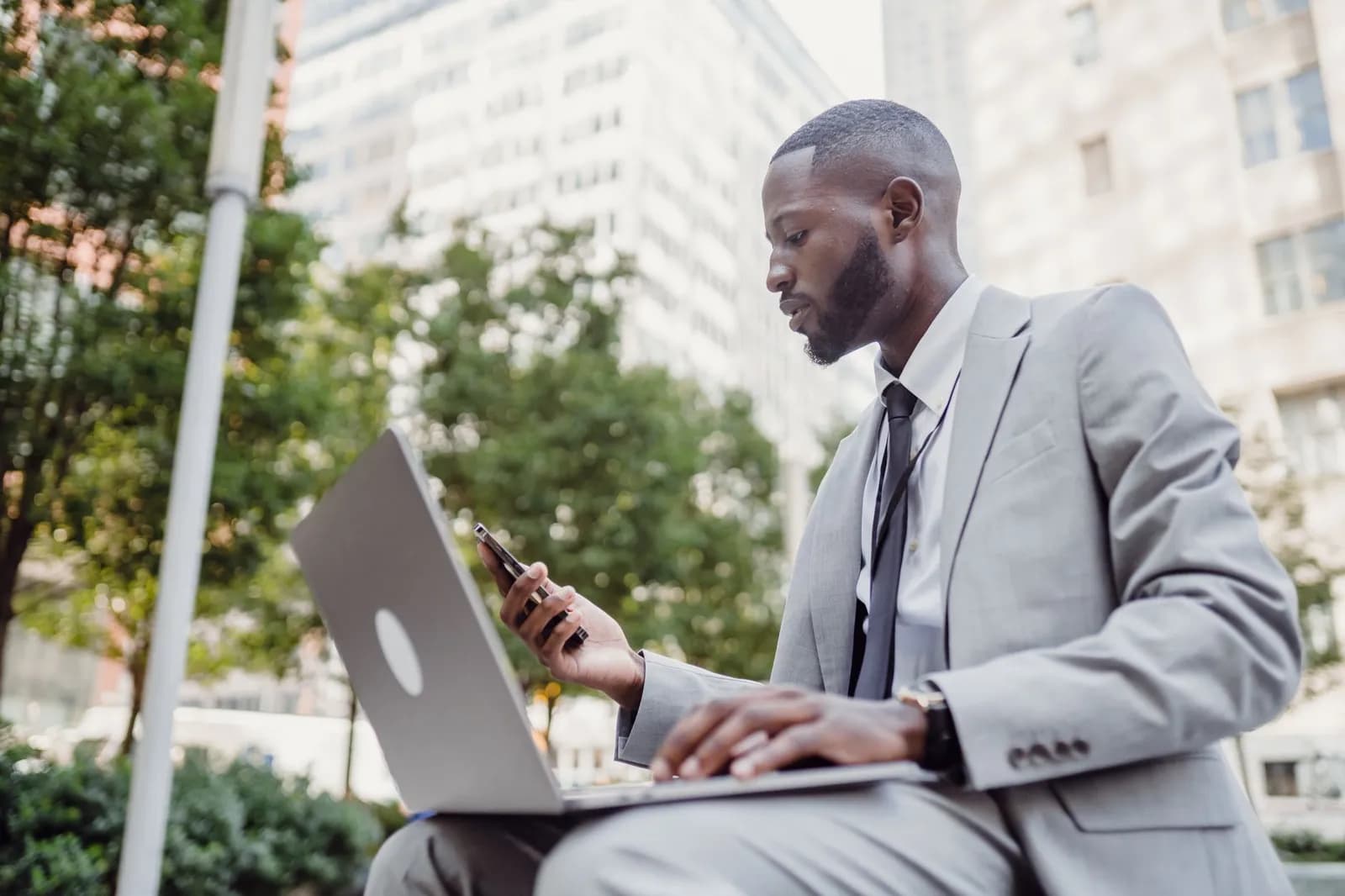 CRM for lead generation: a business owner reviewing new enquiries on a laptop
