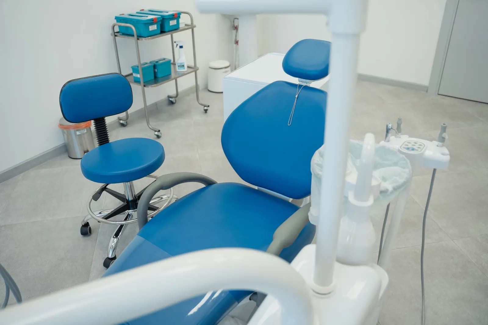 Bright and clean modern dental clinic room with advanced dental equipment.