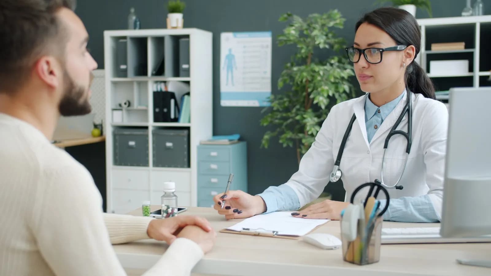 Dermatology marketing strategies: a dermatologist examining a patient's skin in a clinic