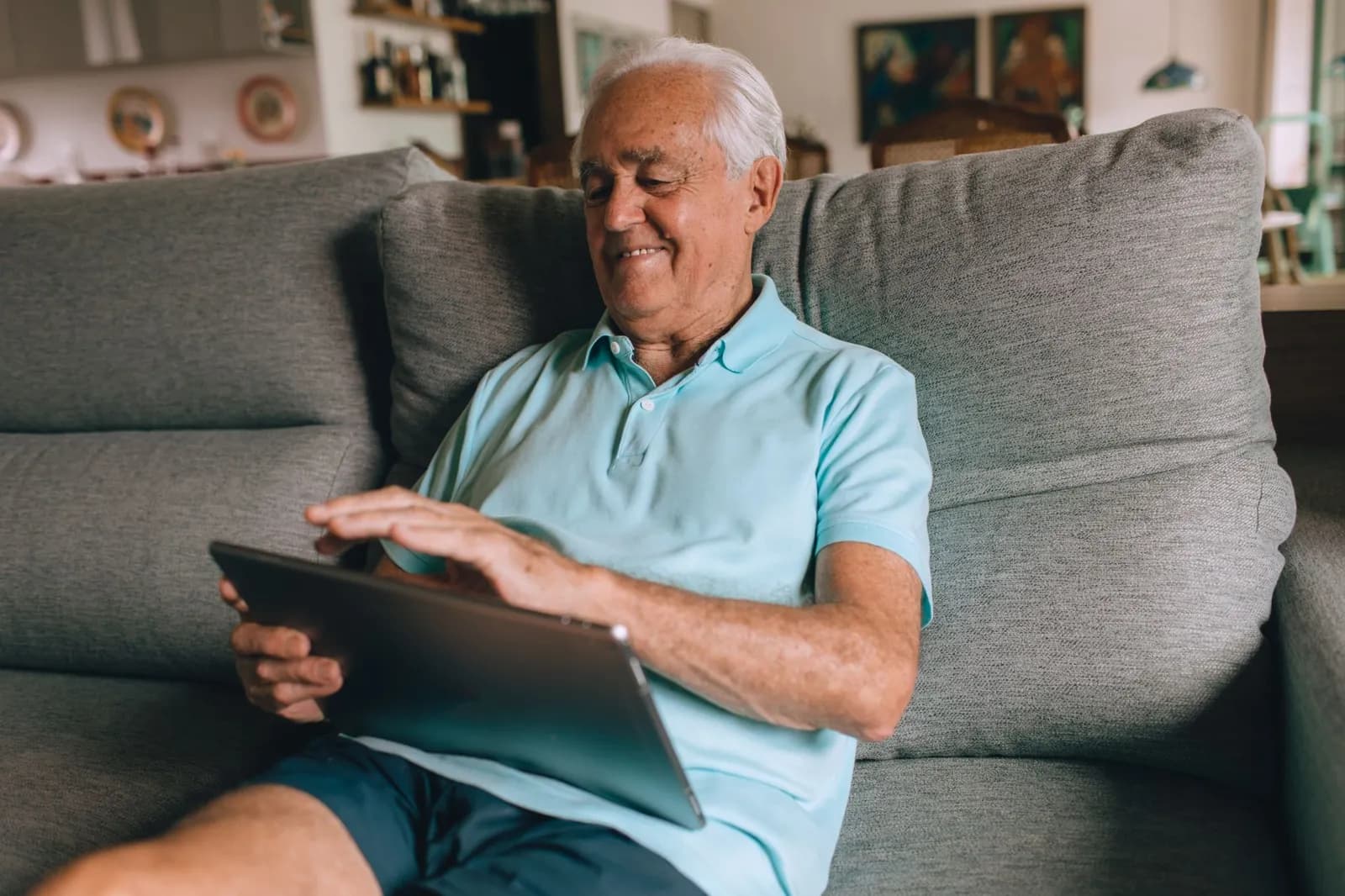 Healthcare gamification software on a phone: a patient checking a health app at home