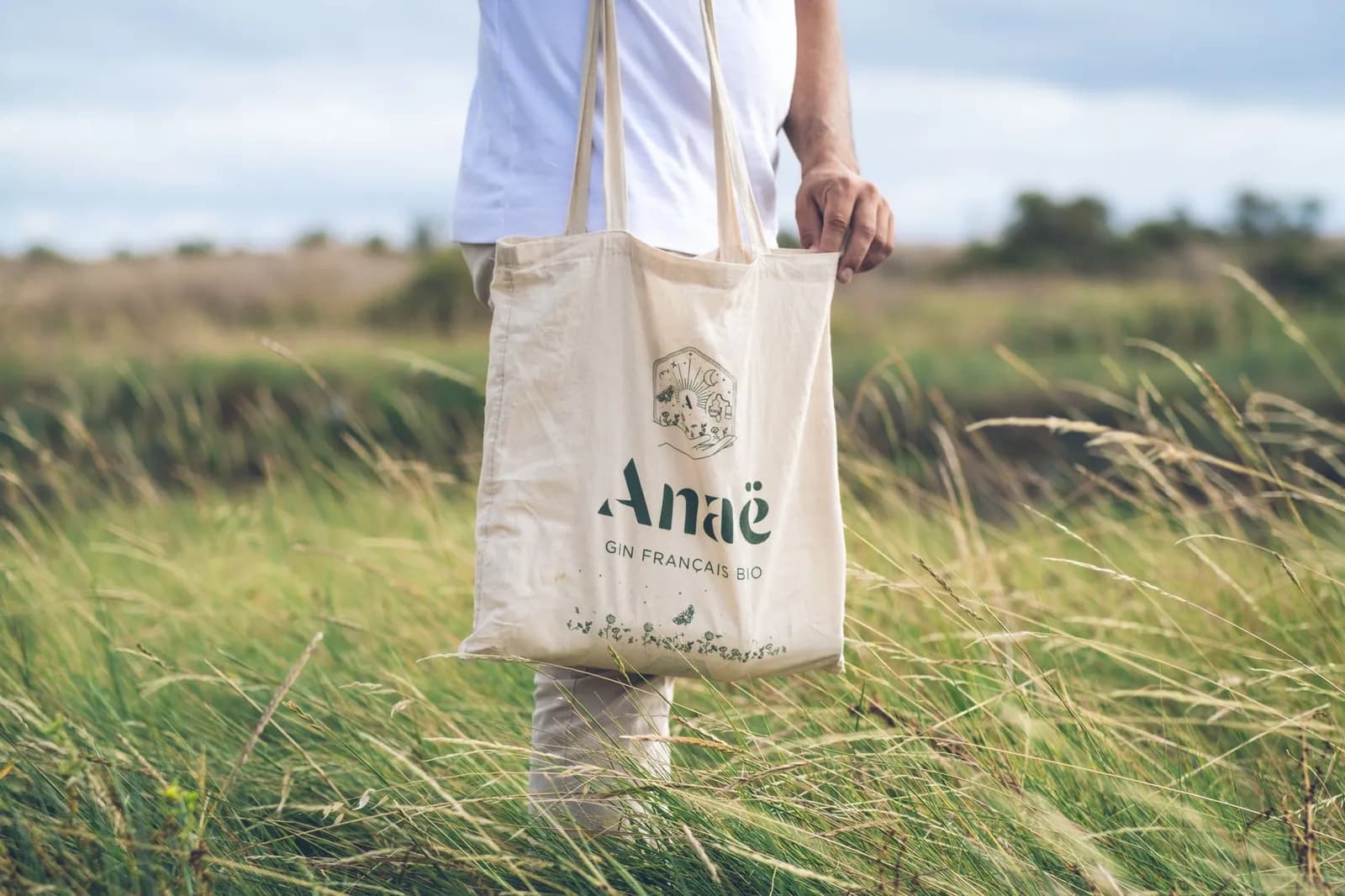 A vibrant display of Canva Community Labs tote, badges, and stationery.