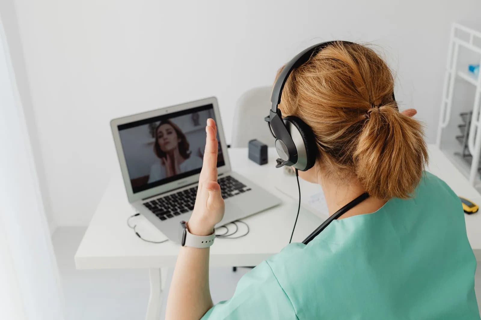 Telehealth marketing strategy: a doctor on a video call with a patient