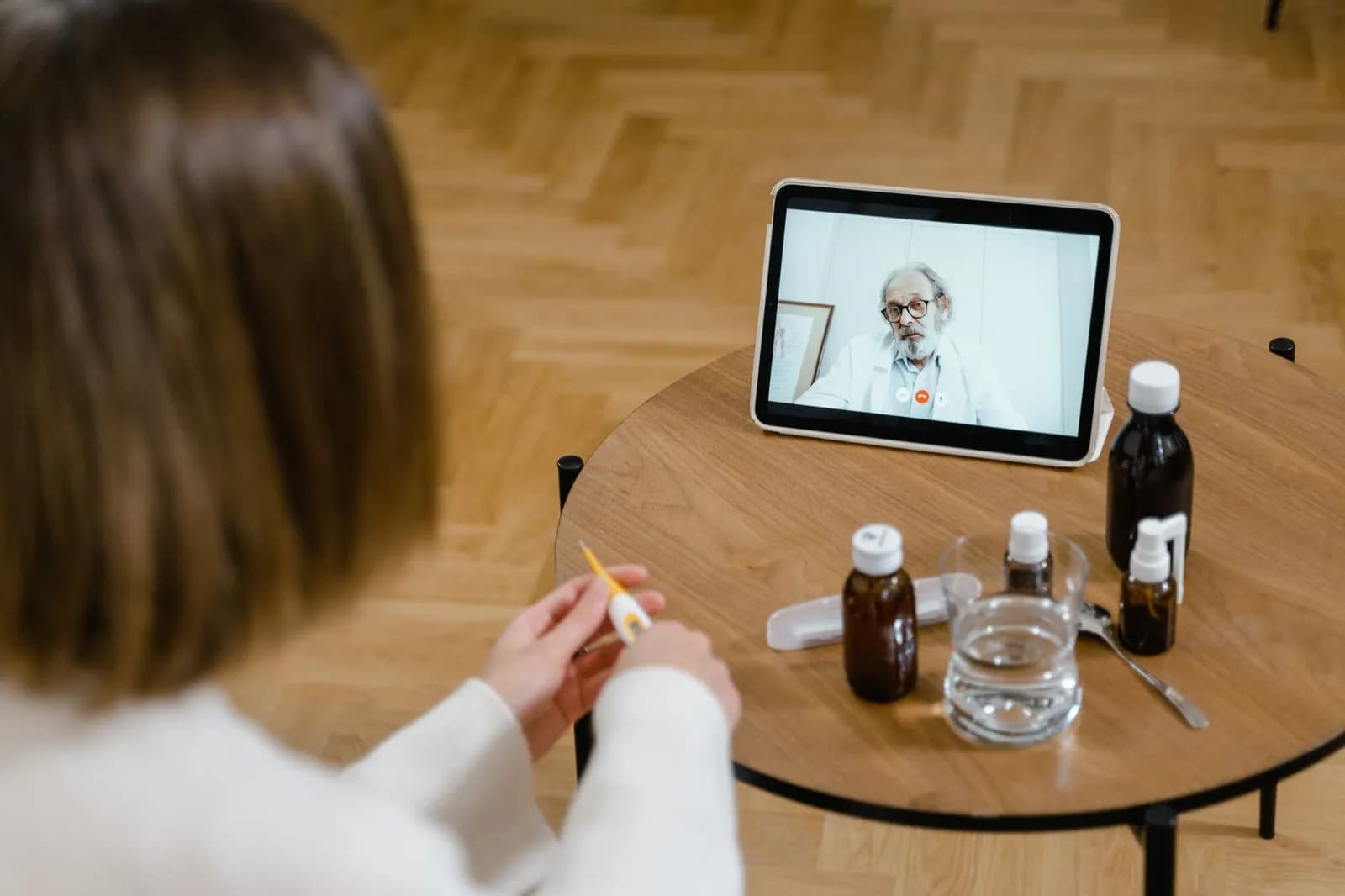 Virtual hospital platform development: a doctor holding a video consultation with a patient