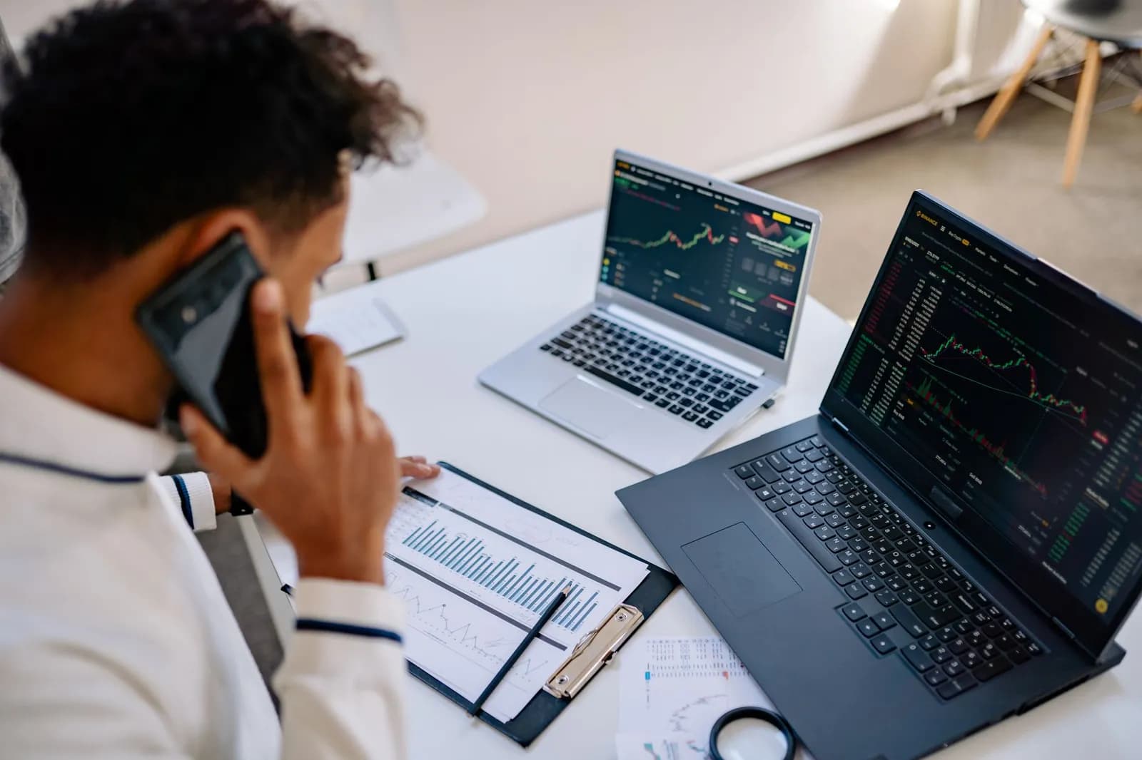 A close-up view of cryptocurrency trading charts showing a bearish trend in a digital market on a computer screen.