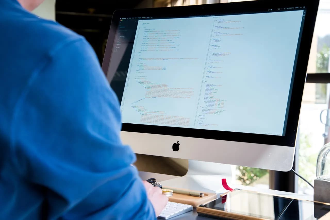 Close view of computer screen displaying HTML code with an authentication error.