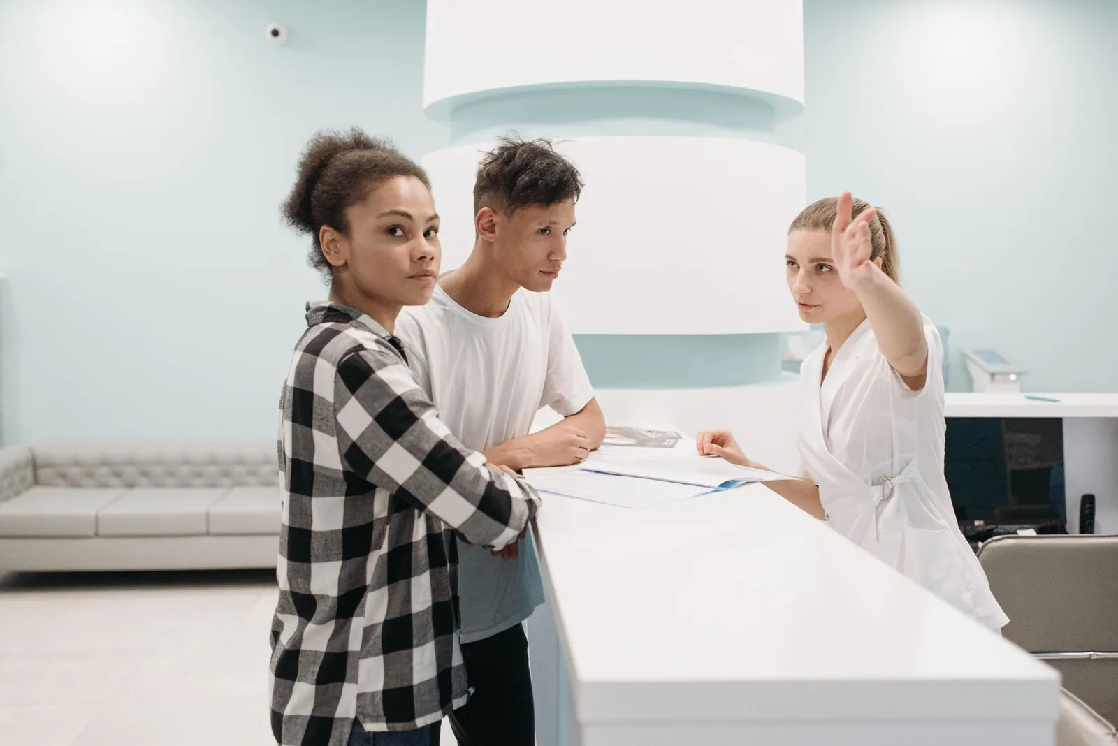 Healthcare CRM marketing integration at the front desk of a medical practice
