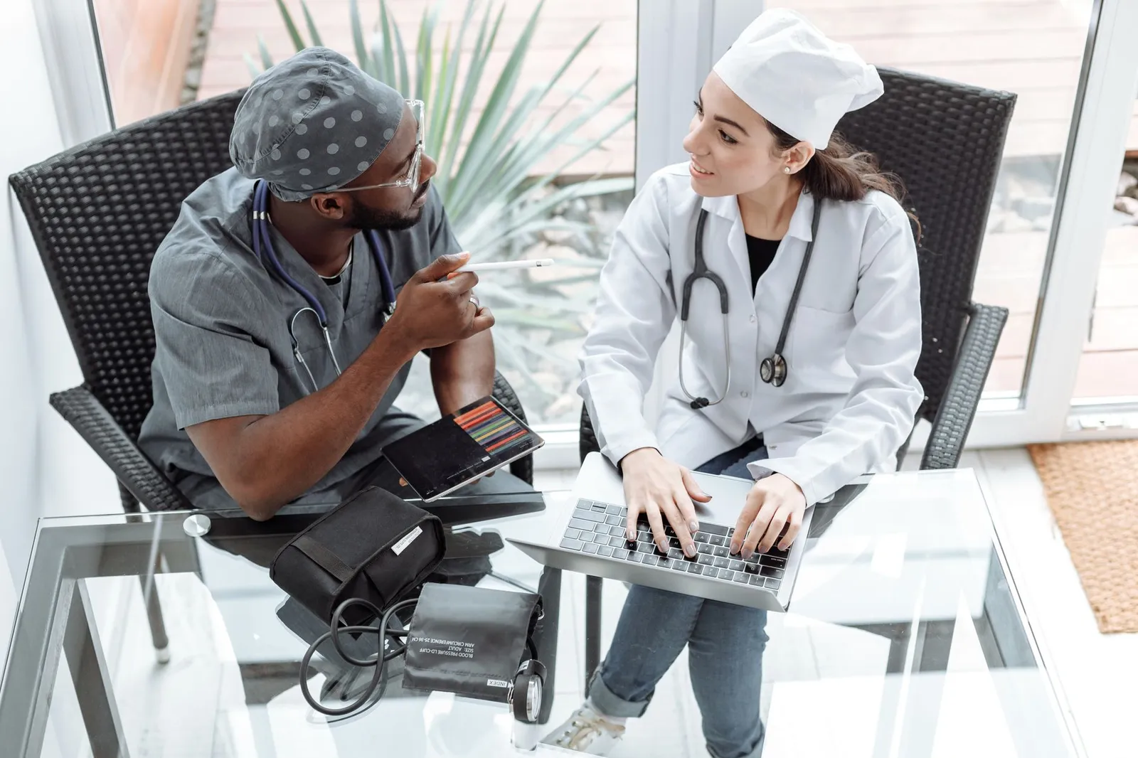 HIPAA compliant cloud hosting for a clinic where a doctor reviews records on a laptop