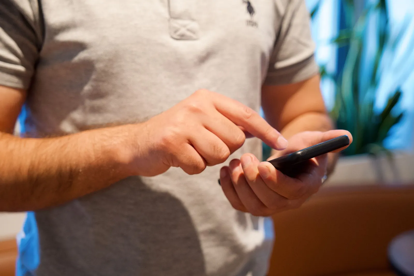 Tree service conversion optimization starts with a homeowner searching on a phone